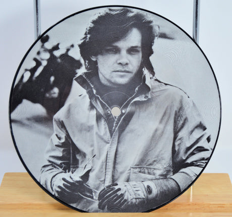John Cougar 'Hand To Hold Onto' Vinyl Picture Disc showing him wearing a jacket.
