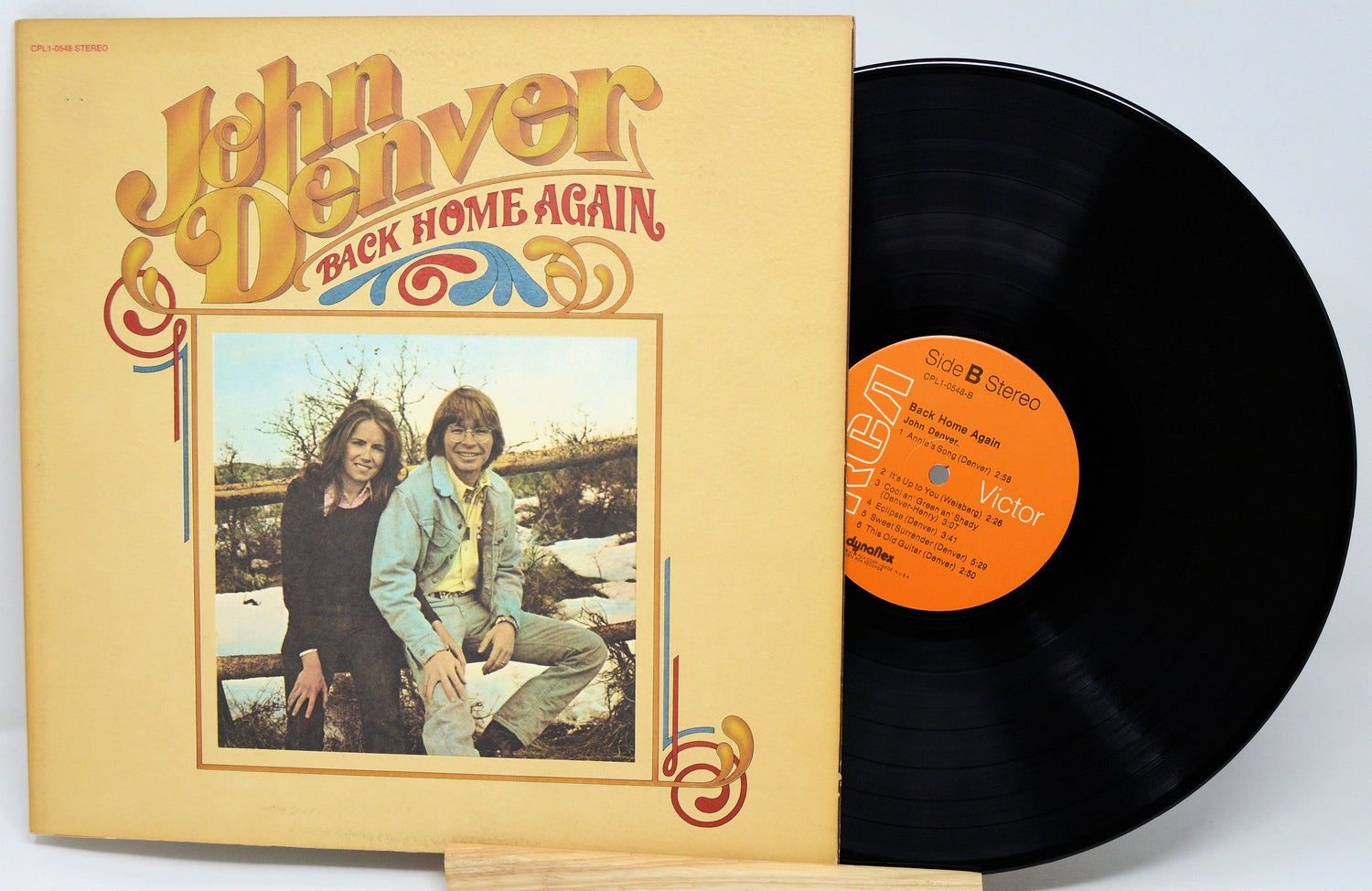 Vinyl record and cover of 'Back Home Again' by John Denver