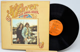 Vinyl record and cover of 'Back Home Again' by John Denver