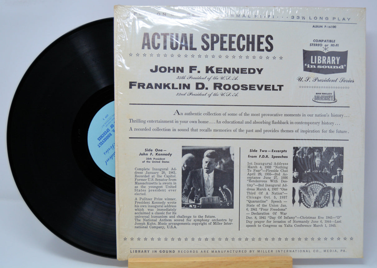 Vinyl record with back cover featuring speeches by John F. Kennedy and Franklin D. Roosevelt on a light gray background.