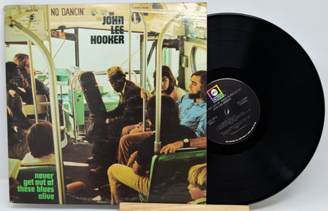 Vinyl record album 'No Dancin'' by John Lee Hooker, showing the illustrated cover on the left and the black LP record on the right against a light gray background.