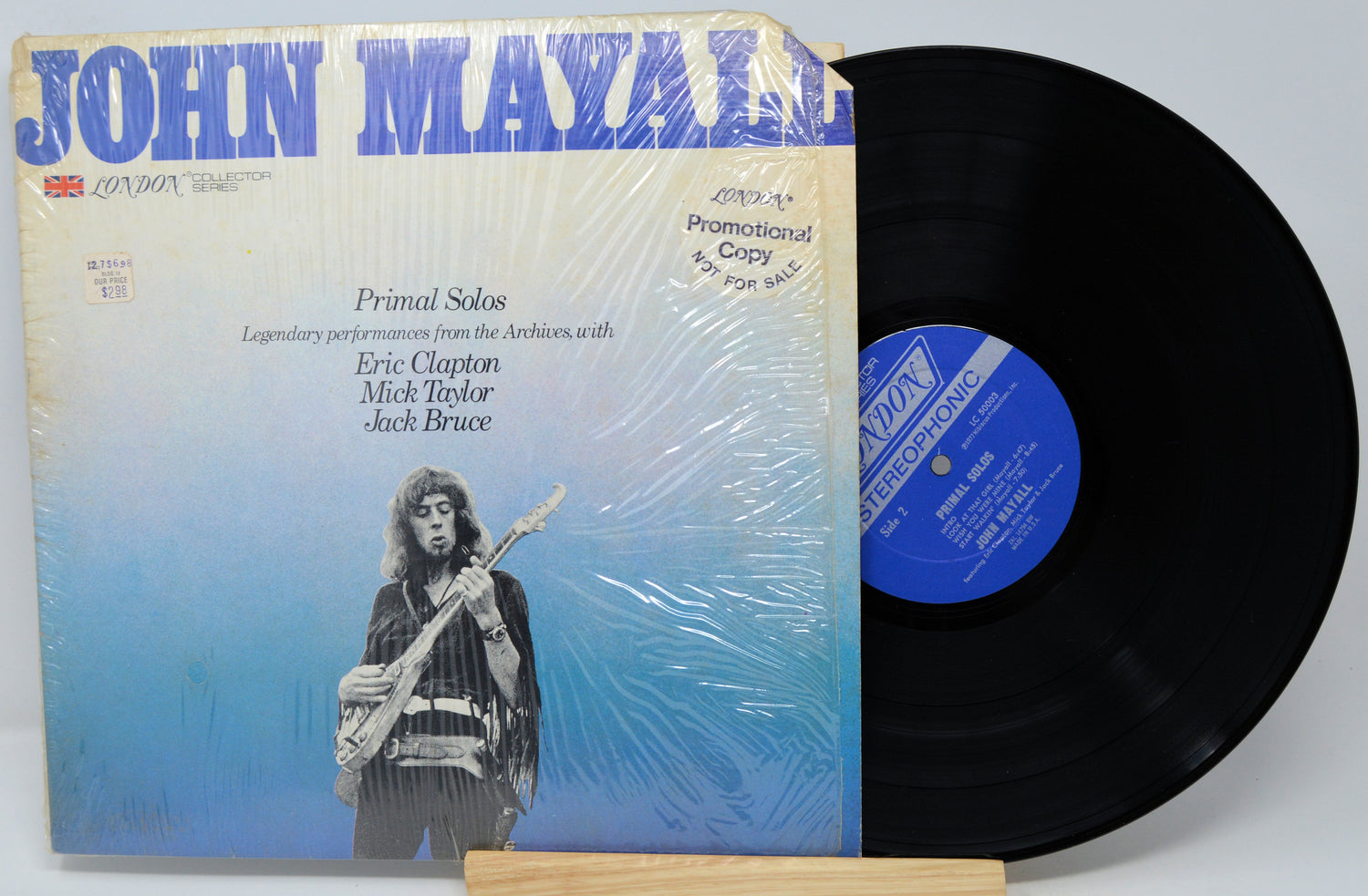Vinyl record with John Mayall cover featuring a guitar player and text.