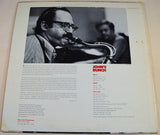 Back cover of John's Bunch LP featuring Al Cohn playing saxophone and album details