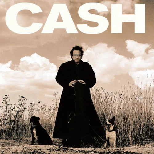 Album cover with a person and two dogs in a field, featuring the word 'CASH'.