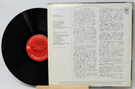 Vinyl record with a letter on the cover and Columbia label