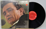 Vinyl record with cover featuring a close-up of a person's face, Columbia label visible