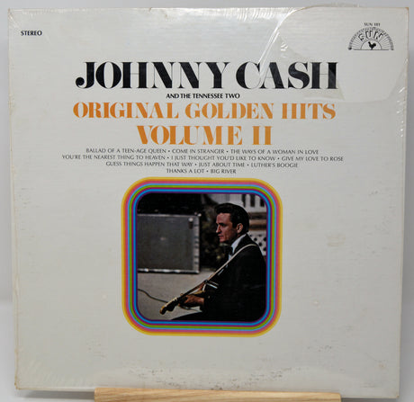 Vinyl record cover for Johnny Cash's 'Original Golden Hits Volume II' with a photo of Johnny Cash playing guitar.