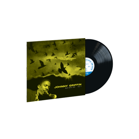 Johnny Griffin Vol. 2 Blue Note vinyl record partially out of sleeve with yellow album cover featuring Griffin playing saxophone and birds in flight