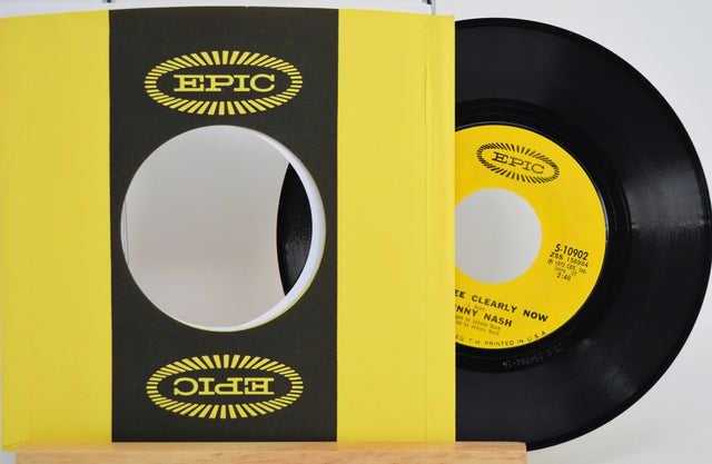 Johnny Nash 'I Can See Clearly Now' Vinyl record with yellow label and black sleeve on a white background