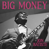 Black and white photo of Jon Batiste passionately playing guitar under 'BIG MONEY' album title