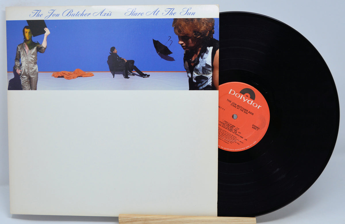 Vinyl record with cover featuring artistic illustrations on a white background