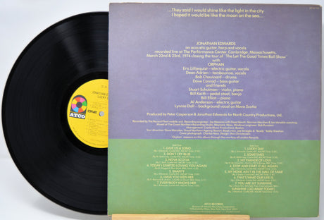 Vinyl record 'Jonathan Edwards Lucky Day' with a colorful label and back cover with text