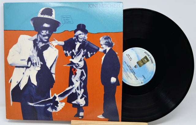 Joni Mitchell 'The House of Cards' vinyl record LP with its illustrated cover sleeve and a portion of the black record visible, photographed against a light gray background.