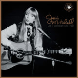 Black and white photo of Joni Mitchell playing guitar with text 'Joni Mitchell Live at Canterbury House 1967' on a dark background.