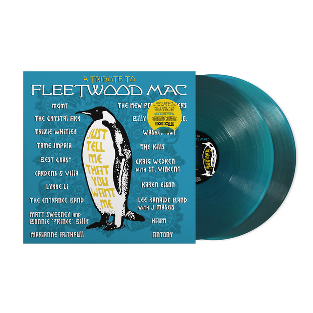 Vinyl record with blue cover featuring a penguin illustration and text, on a black background.