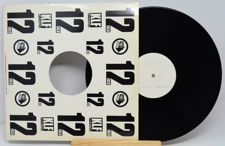Vinyl record with a cover featuring the number 12 on a white background