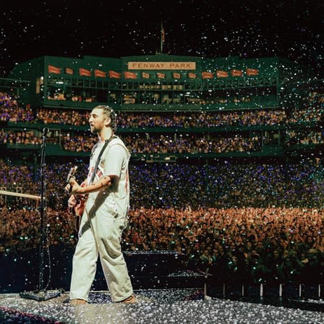 A vinyl record album cover featuring a live performance by Noah Kahan at Fenway Park. The image shows Noah Kahan on stage with a crowd in the background.