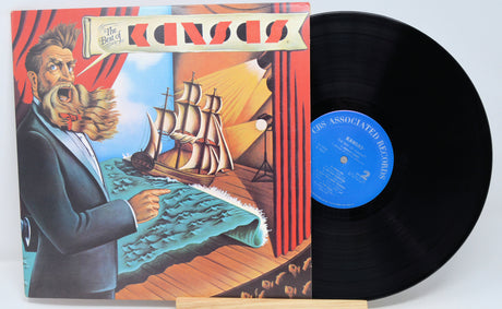 A vinyl record album titled 'Kansas - Best Of' with a colorful album cover featuring an illustration of a man with a beard, a ship, and a map.