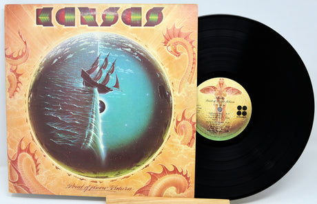 Vinyl record with a colorful cover featuring a ship and celestial design.
