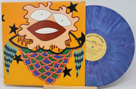 Vinyl record with a colorful cover featuring abstract art and a blue record.
