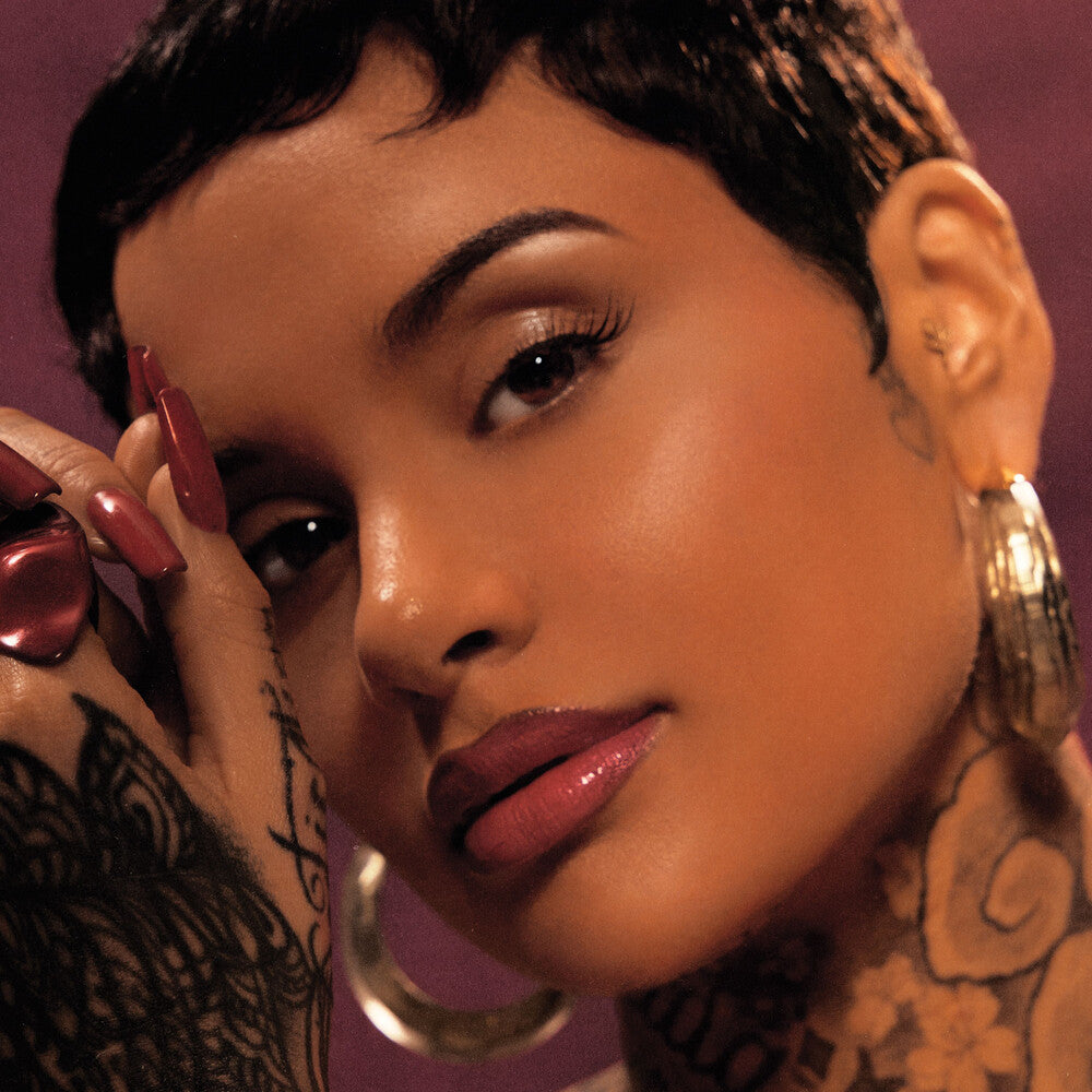 Vinyl record cover of Kehlani new self titled album featuring a close up of her stunningly beautiful face and hands.