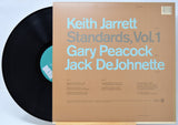 'Keith Jarrett Standards Vol 1' Vinyl record and Back cover with blue text on a brown background.