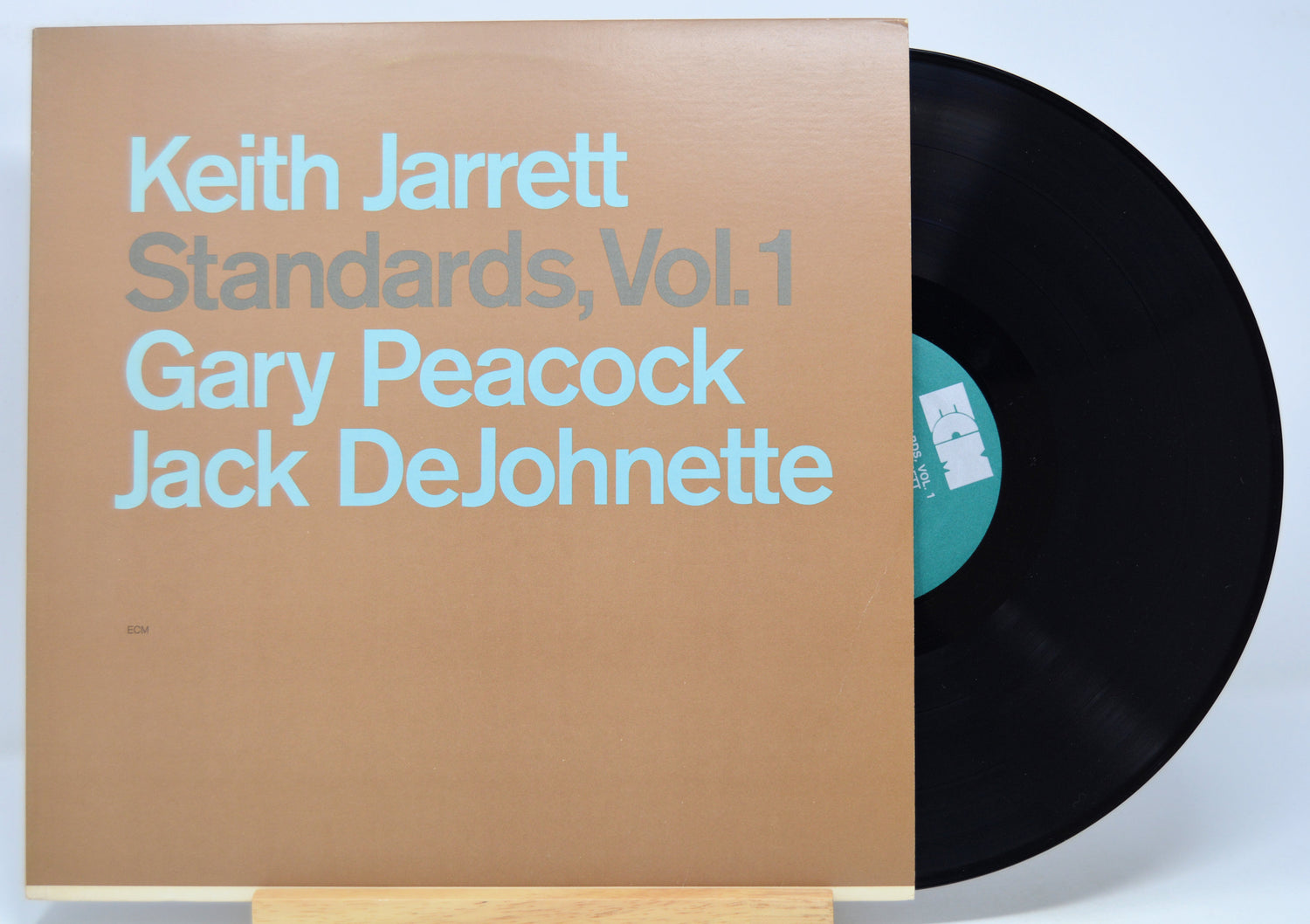 'Keith Jarrett Standards Vol 1' Vinyl record and front cover with blue text on a brown background.