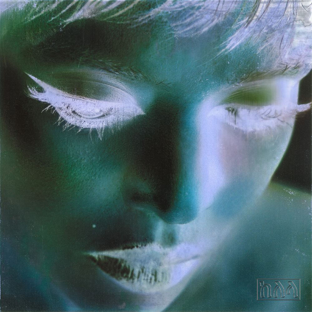 Close-up of a person's face with a blurred background