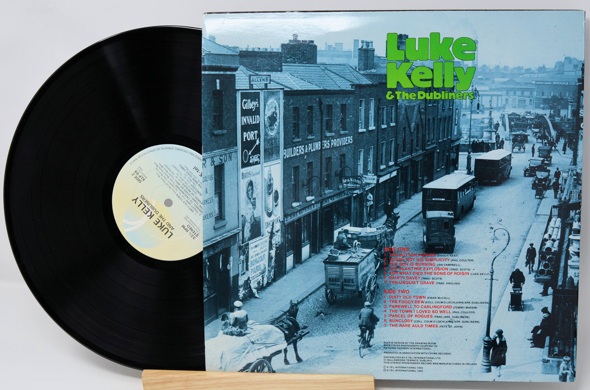 Vinyl record with cover featuring a city street scene and 'Luke Kelly & The Dubliners' text.