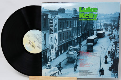 Vinyl record with cover featuring a city street scene and 'Luke Kelly & The Dubliners' text.