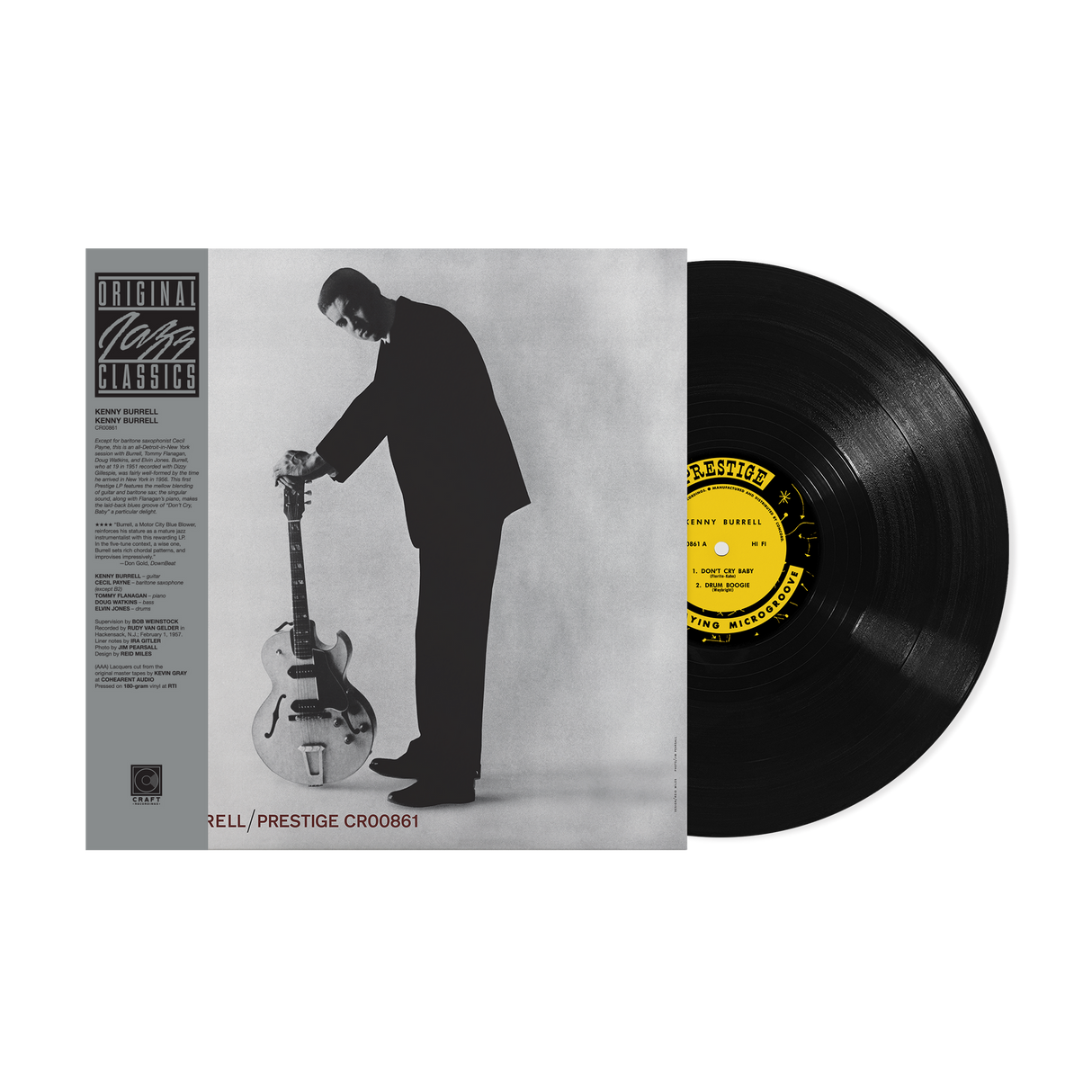 Vinyl record with a yellow label and a black and white album cover of a man playing guitar.
