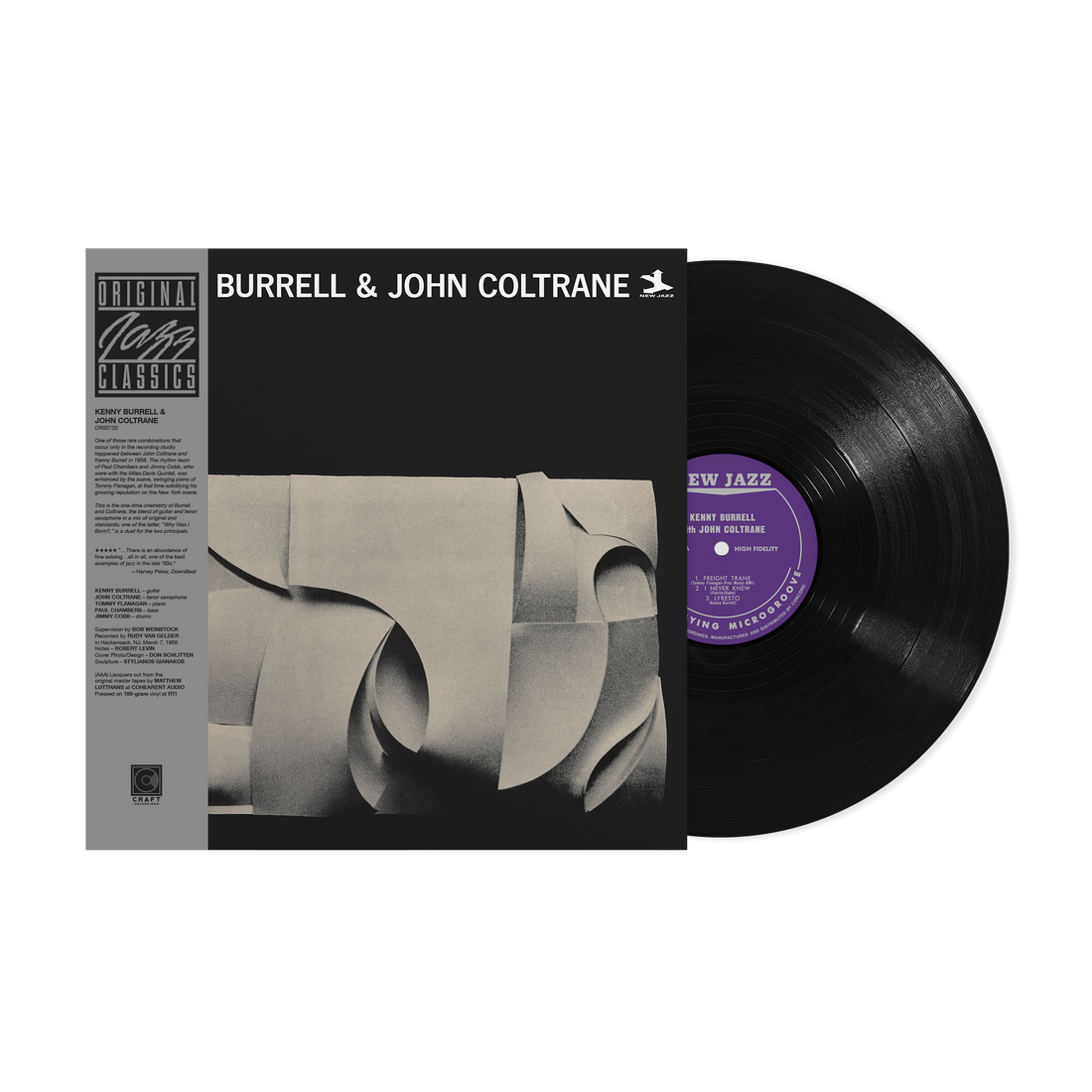 Vinyl record with cover featuring 'Kenny Burrell & John Coltrane' on a white background