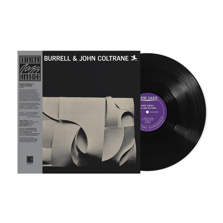 Vinyl record with cover featuring 'Kenny Burrell & John Coltrane' on a white background