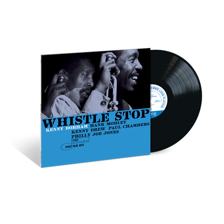 Vinyl record with 'Whistle Stop' album cover featuring a blue band at the bottom.