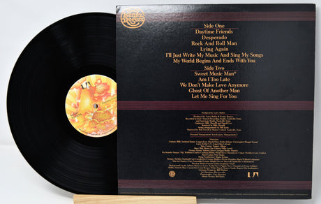 Back cover of Kenny Rogers Daytime Friends vinyl record showing track listing and credits