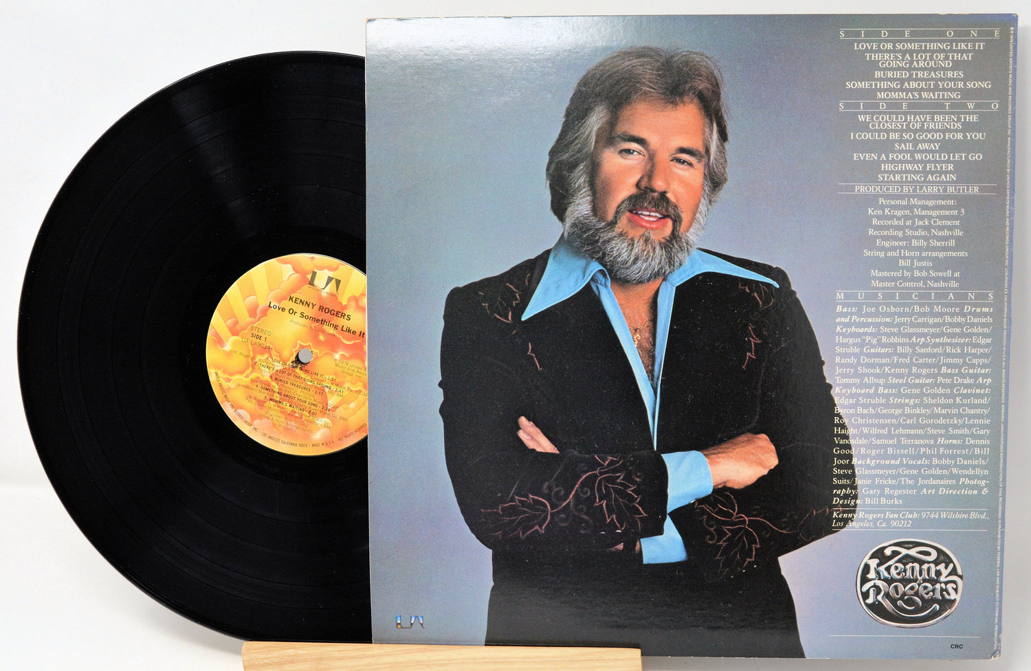 Back cover of Kenny Rogers' 'Love Or Something Like It' vinyl LP featuring tracklist and artist portrait