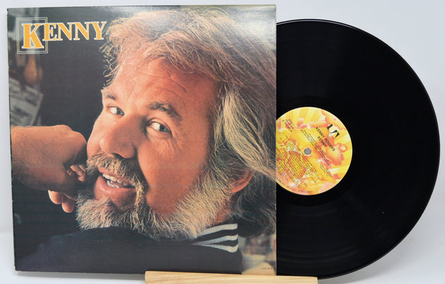 Front cover and vinyl record of Kenny Rogers' album featuring a close-up portrait