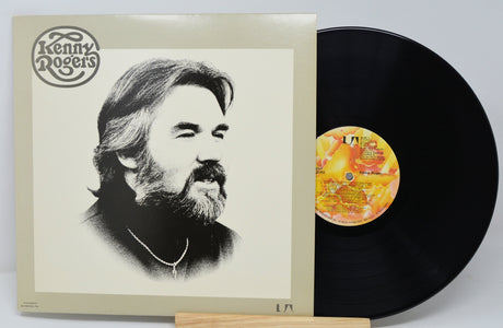 Front cover of Kenny Rogers vinyl record album featuring artist portrait and logo