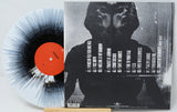 Limited edition black and white splatter vinyl record with tracklist and abstract portrait on the back cover