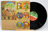 A vinyl record album titled 'King Crimson - Lizard' with a colorful album cover featuring various illustrations.