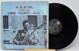 Vinyl record with cover featuring B.B. King and text 'B.B. King Live in Cook County Jail' on a white background.