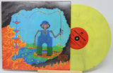 Vinyl record with colorful cover featuring a robot and abstract elements