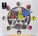 Front cover of 'King of Cowards' limited edition vinyl with bold, abstract artwork and stickers