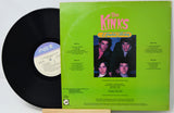Vinyl record with green cover featuring The Kinks album art on a white background