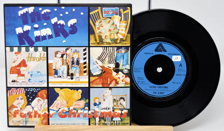 Vinyl record with cover featuring 'The Kinks' and 'Father Christmas' on a white background