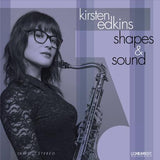 Album cover featuring a woman holding a saxophone with text 'kirsten edkins shapes & sound' on a gradient background.