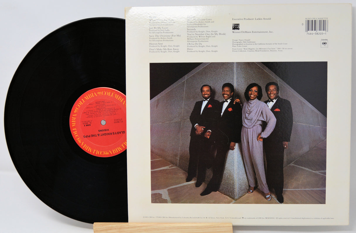 Vinyl record with cover featuring a group of people in formal attire.