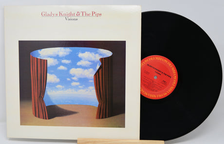 Vinyl record and cover with 'Gladys Knight & The Pips' album art on a white background