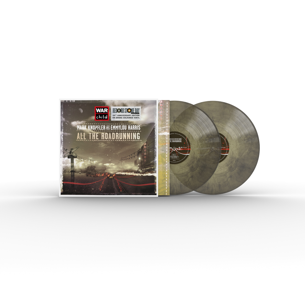 Colored vinyl records with cover showing a street scene.