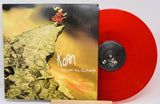 Front cover of Korn Follow the Leader with red vinyl LP displayed